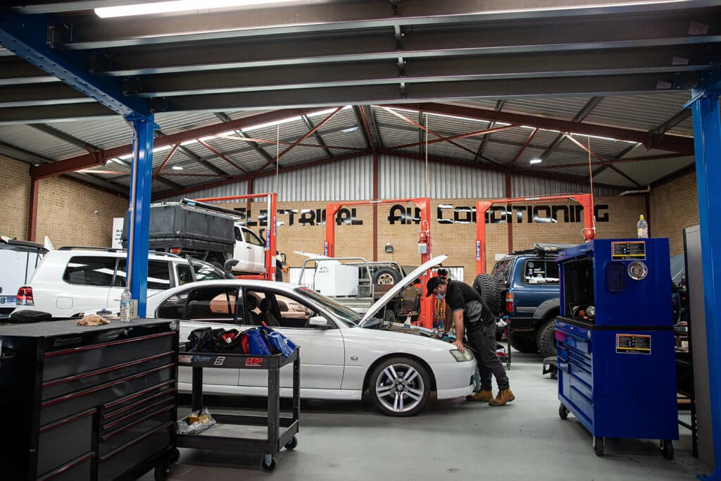 Inside the Votaic auto electrical workshop where employees are diligently working to service vehicles