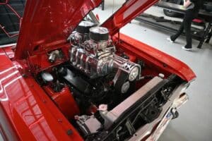 Classic car with its bonnet open showing the internals of a classic car AC retrofit