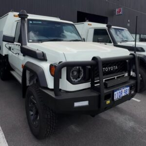 Toyota 79 Series LandCruisers lined up for a fleet fitout