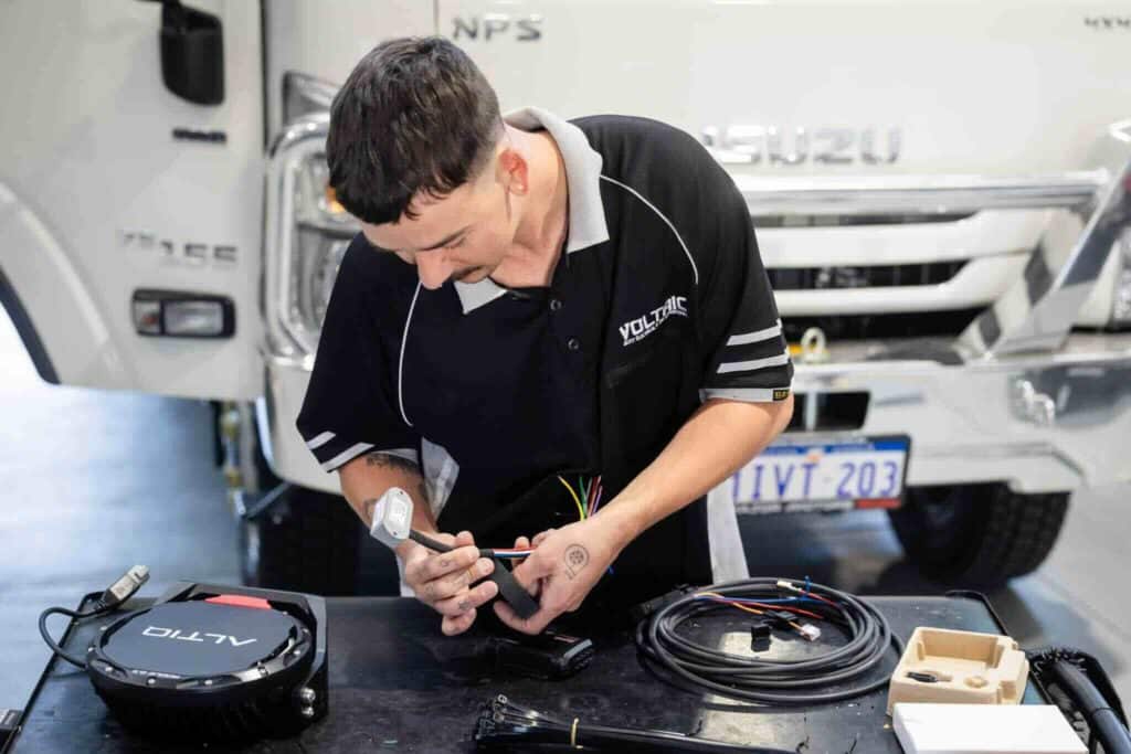 Voltaic auto electrician fitting out a truck